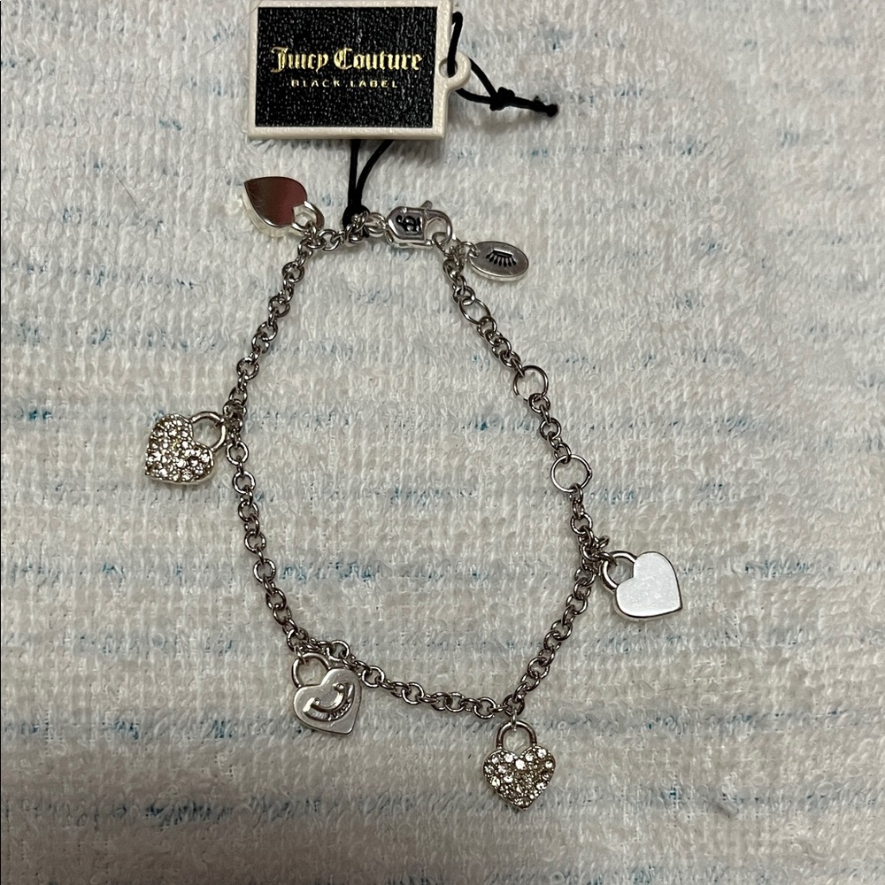 🎀🩶🩷💋🎀🩶🩷💋 JUICY COUTURE BLACK LABEL BRACELET. THERES NO STONES MISSING